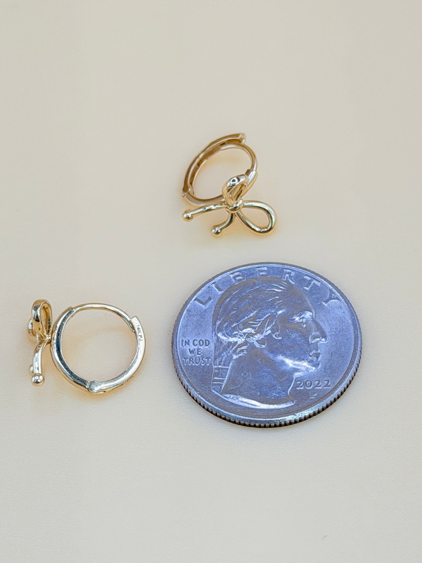 14kt Solid Gold Bow-Shaped Hoop Earrings. e
