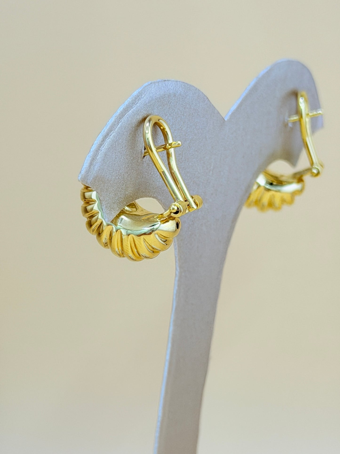 14kt Gold Earrings with Omega Back Closure.