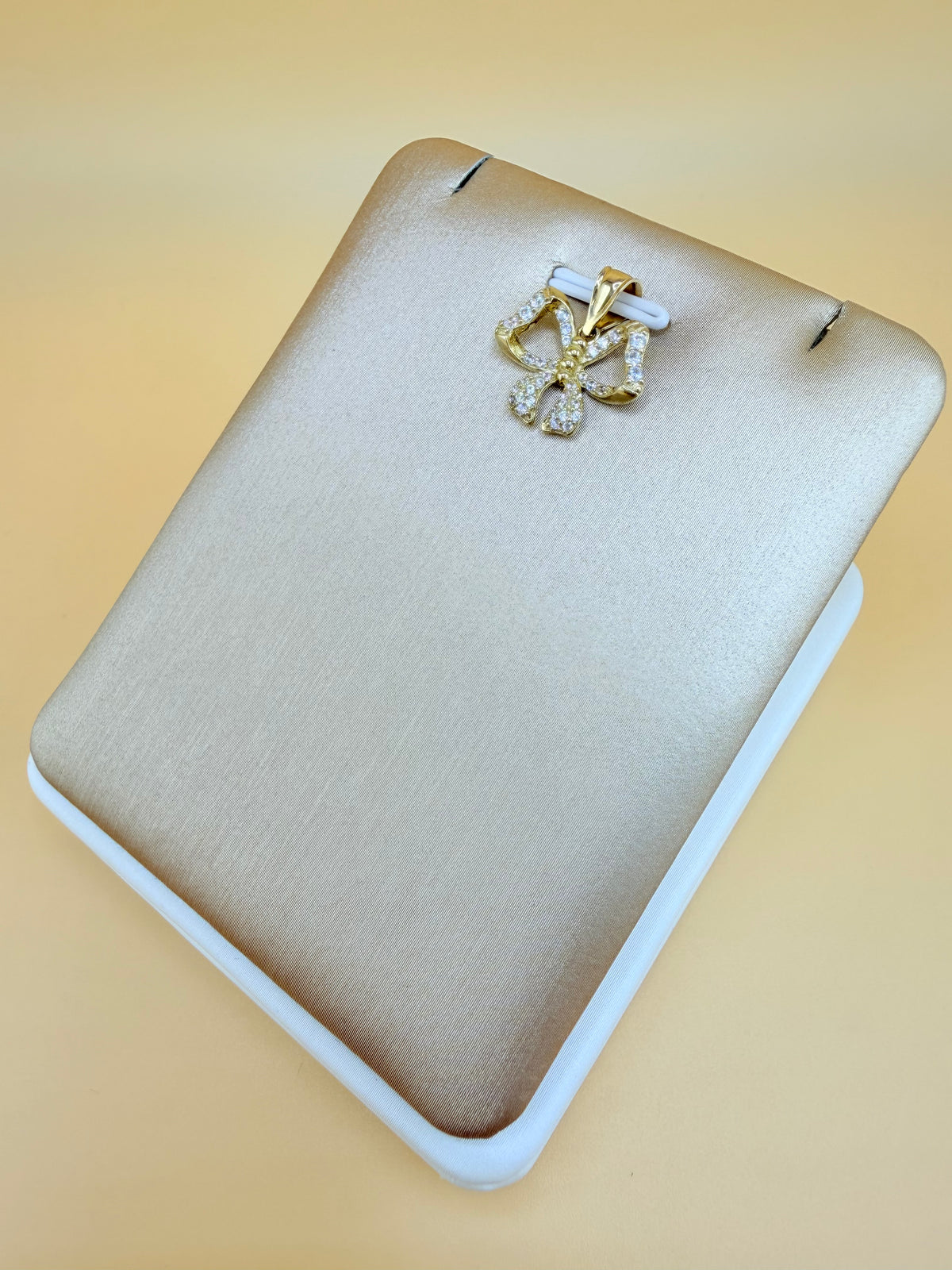 10K Gold Bow Pendant, Fits Chains Up to 3mm Thick. ch