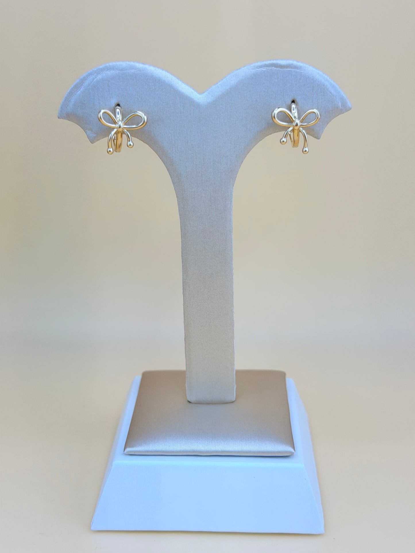 14kt Solid Gold Bow-Shaped Hoop Earrings. e