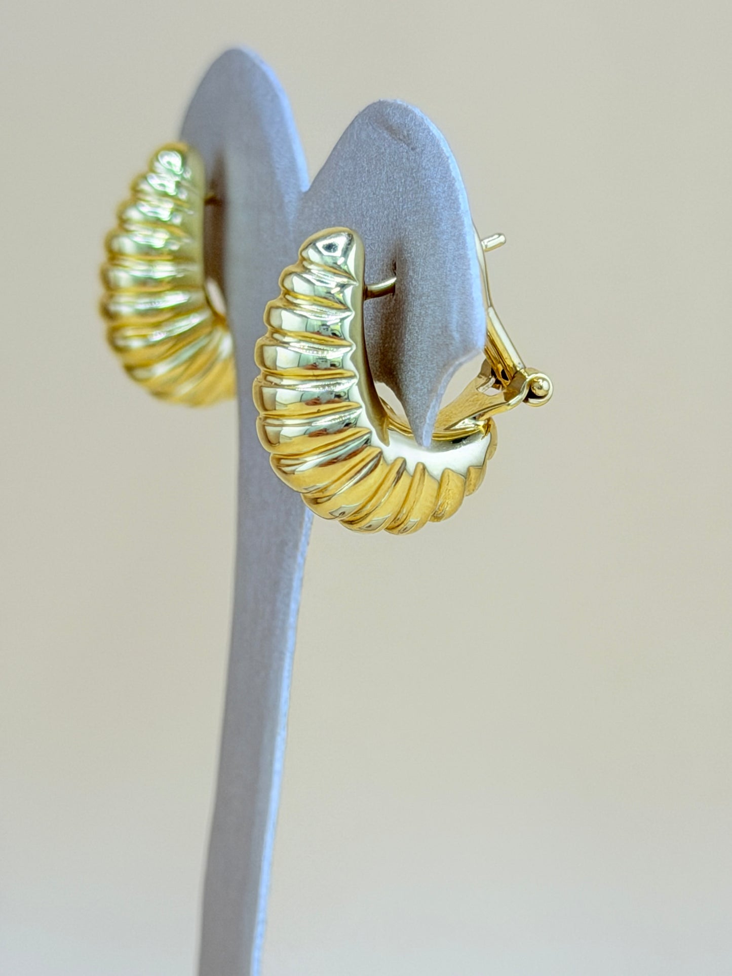 14kt Gold Earrings with Omega Back Closure.