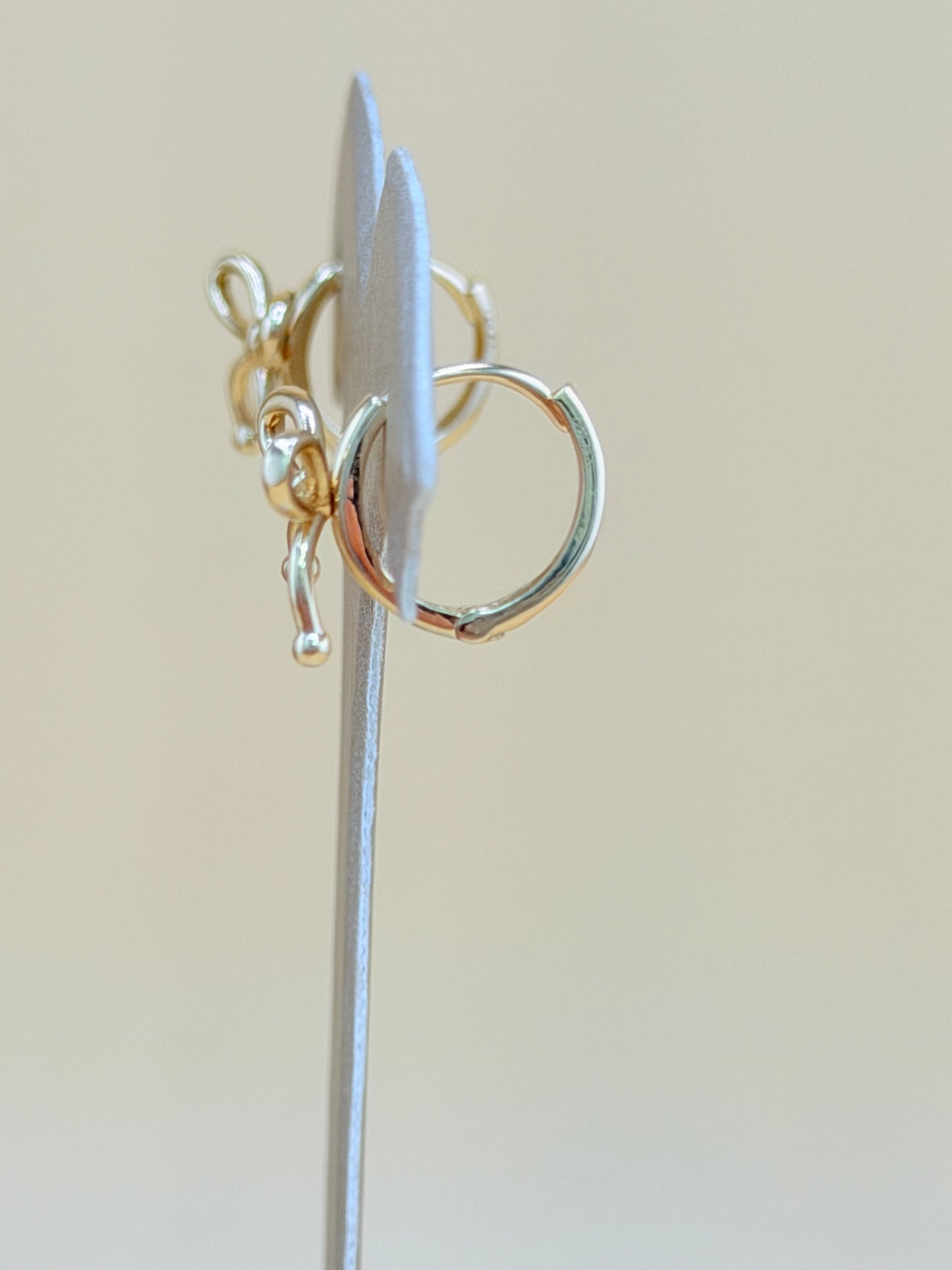 14kt Solid Gold Bow-Shaped Hoop Earrings. e