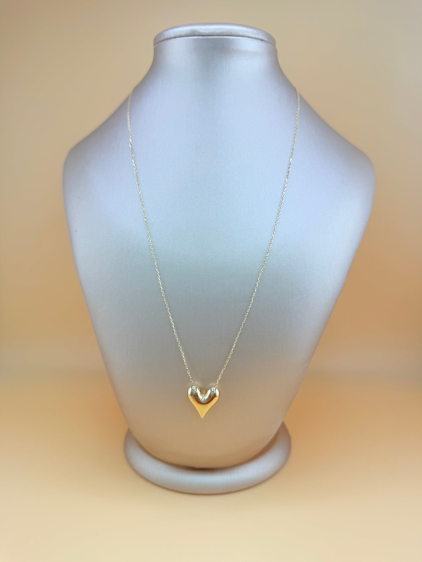 10kt Gold Necklace with a Puffed Heart Pendant, adjustable size 16”–18”.