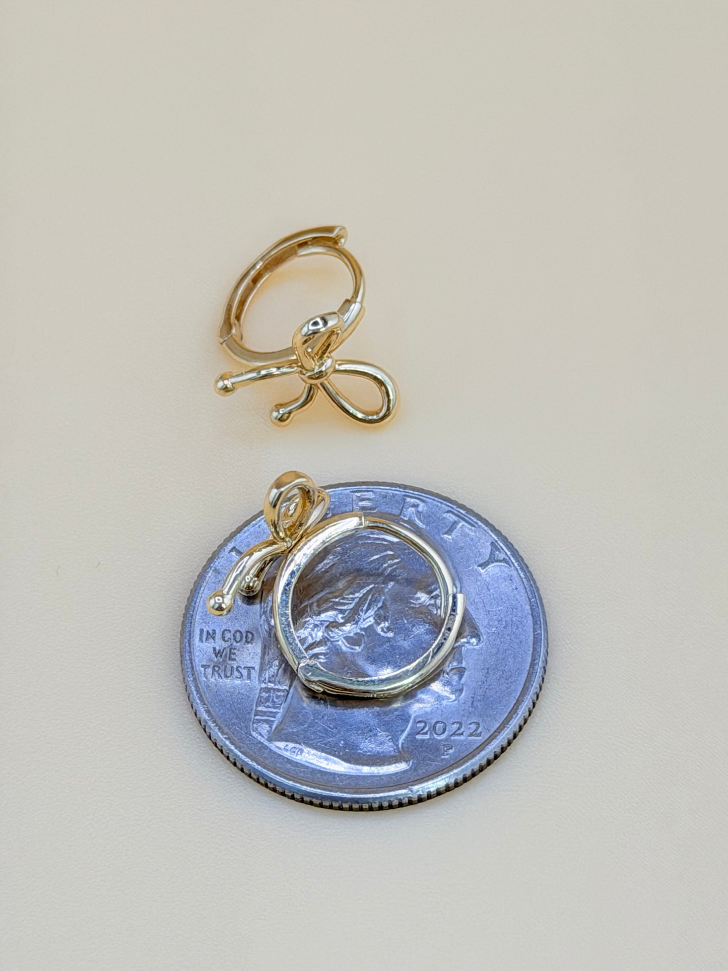 14kt Solid Gold Bow-Shaped Hoop Earrings. e