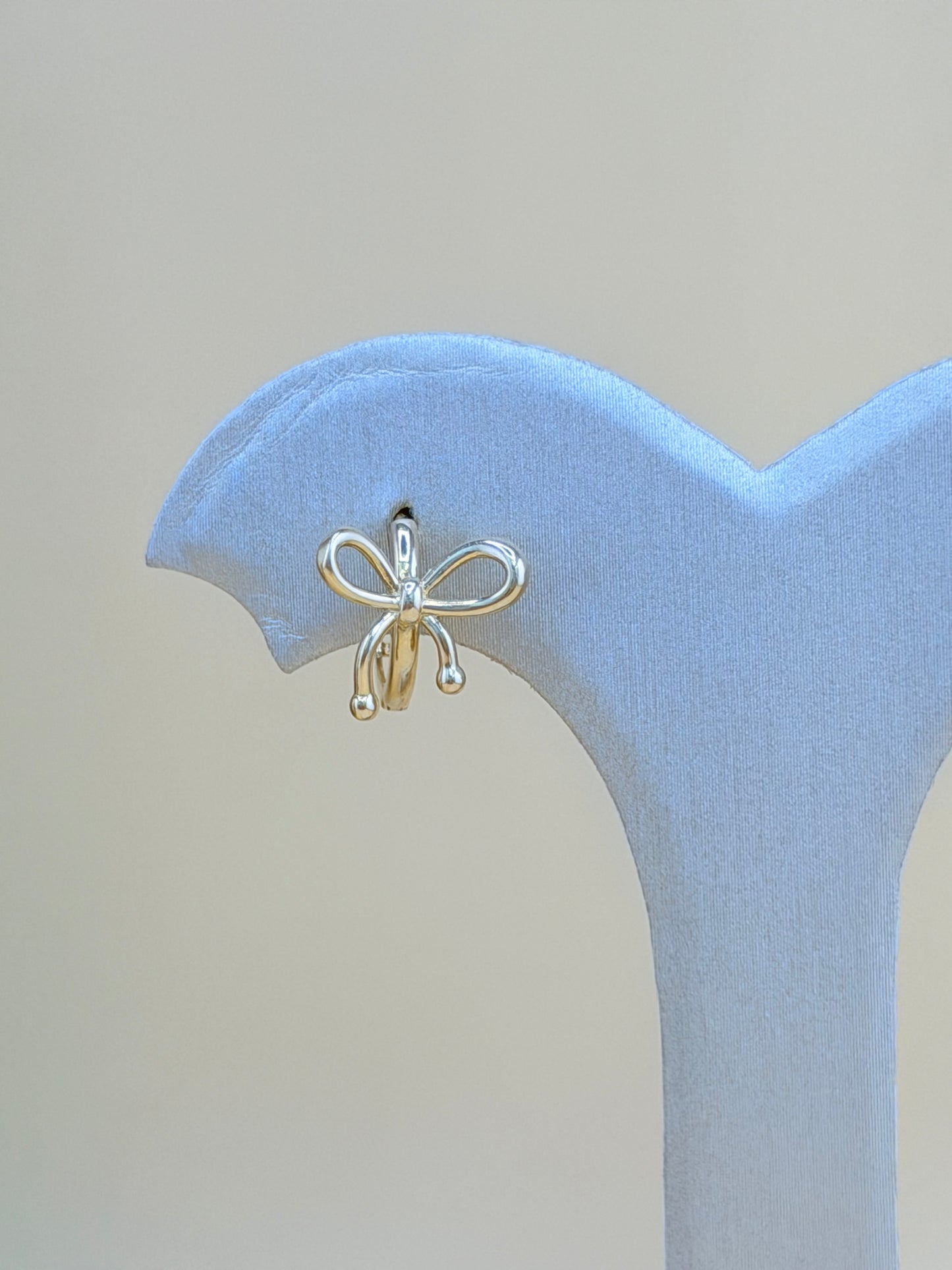 14kt Solid Gold Bow-Shaped Hoop Earrings. e